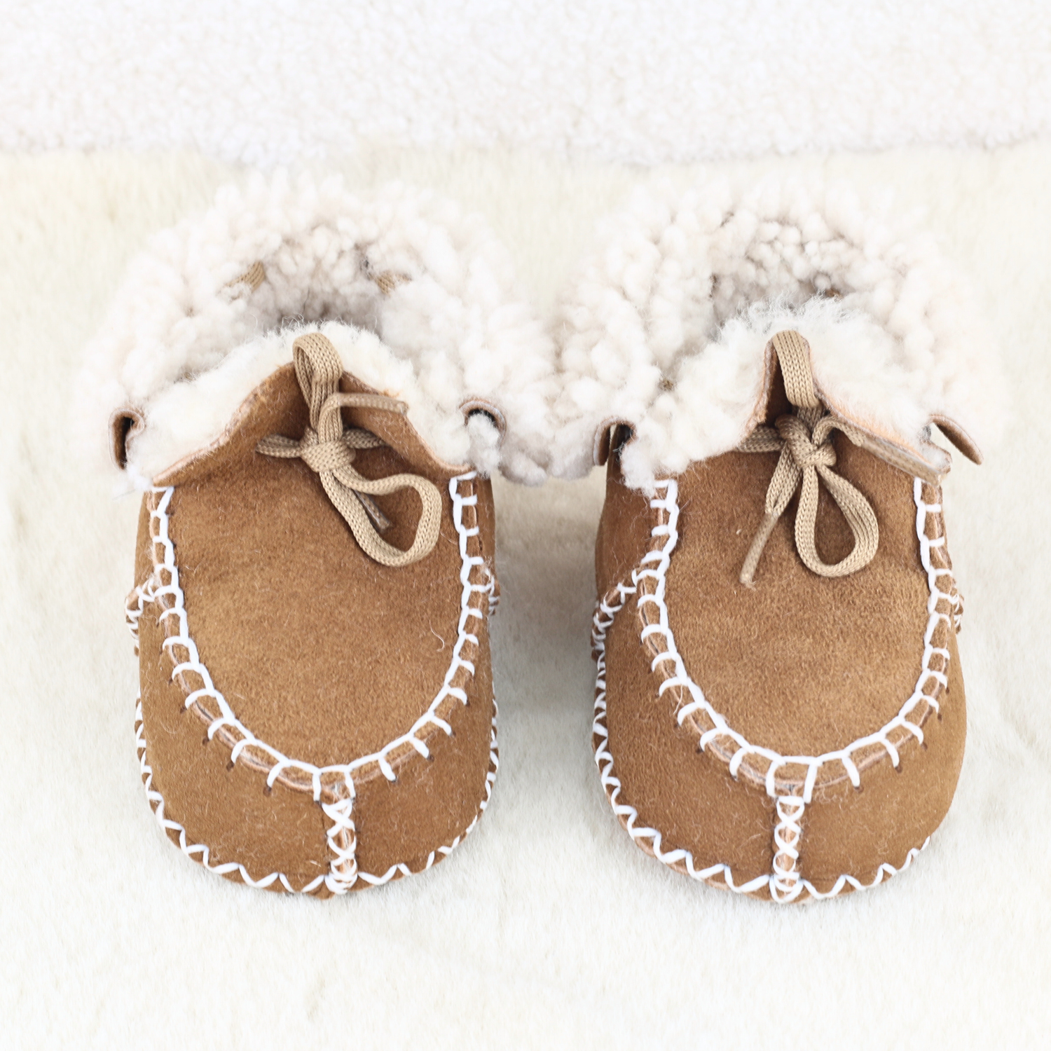 Chestnut sheepskin baby booties with soft wool lining