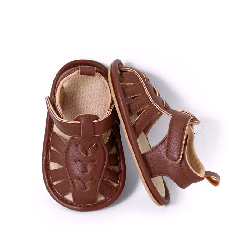 Baby boys brown leather look sandals showing top angle view with beige insole and cut-out straps by Babyli, soft sole baby shoes UK