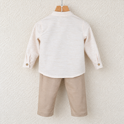 Back of Babyli cream shirt and beige trousers set with coconut cuff buttons