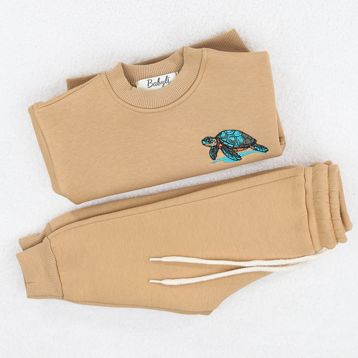 Babyli mustard turtle baby toddler tracksuit flat lay