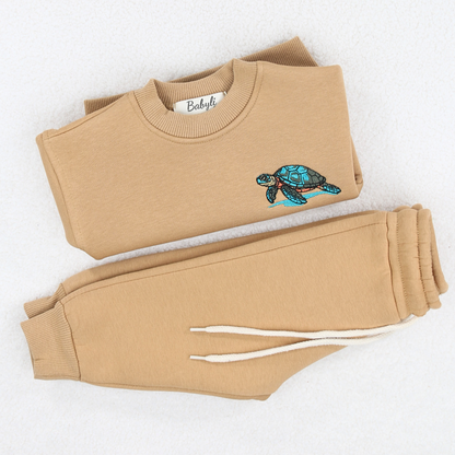 Babyli mustard turtle baby toddler tracksuit flat lay