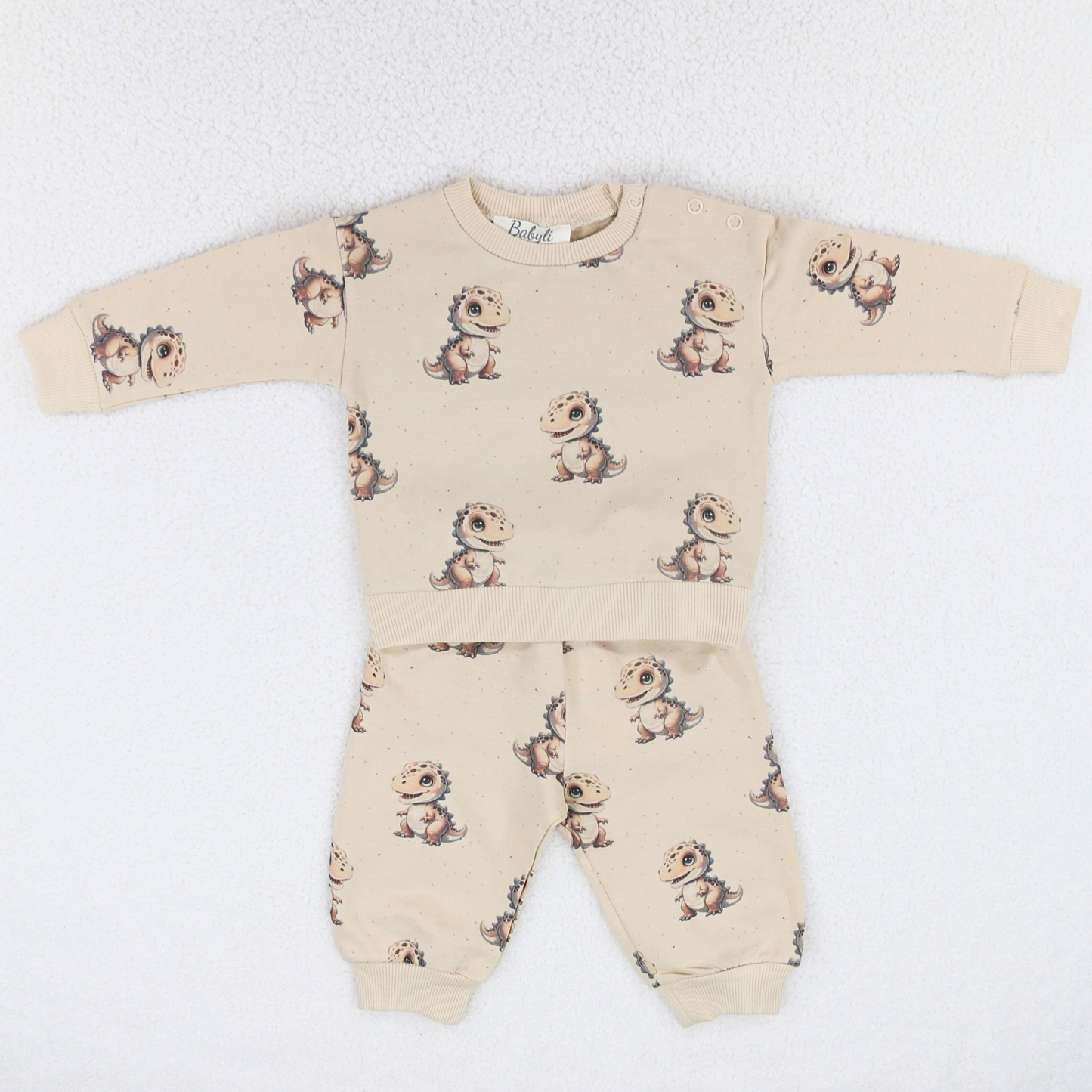 Soft cotton beige baby and toddler set with dinosaur print design
