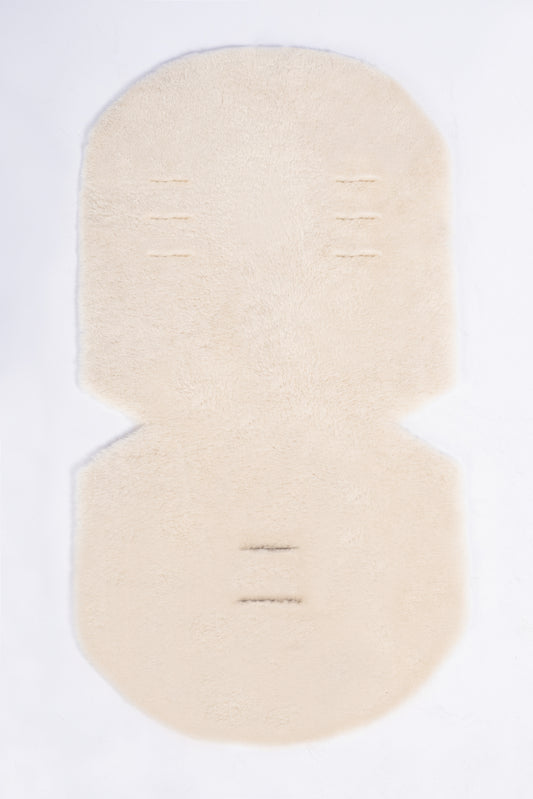 Cosy genuine sheepskin baby pram liner with soft wool finish.