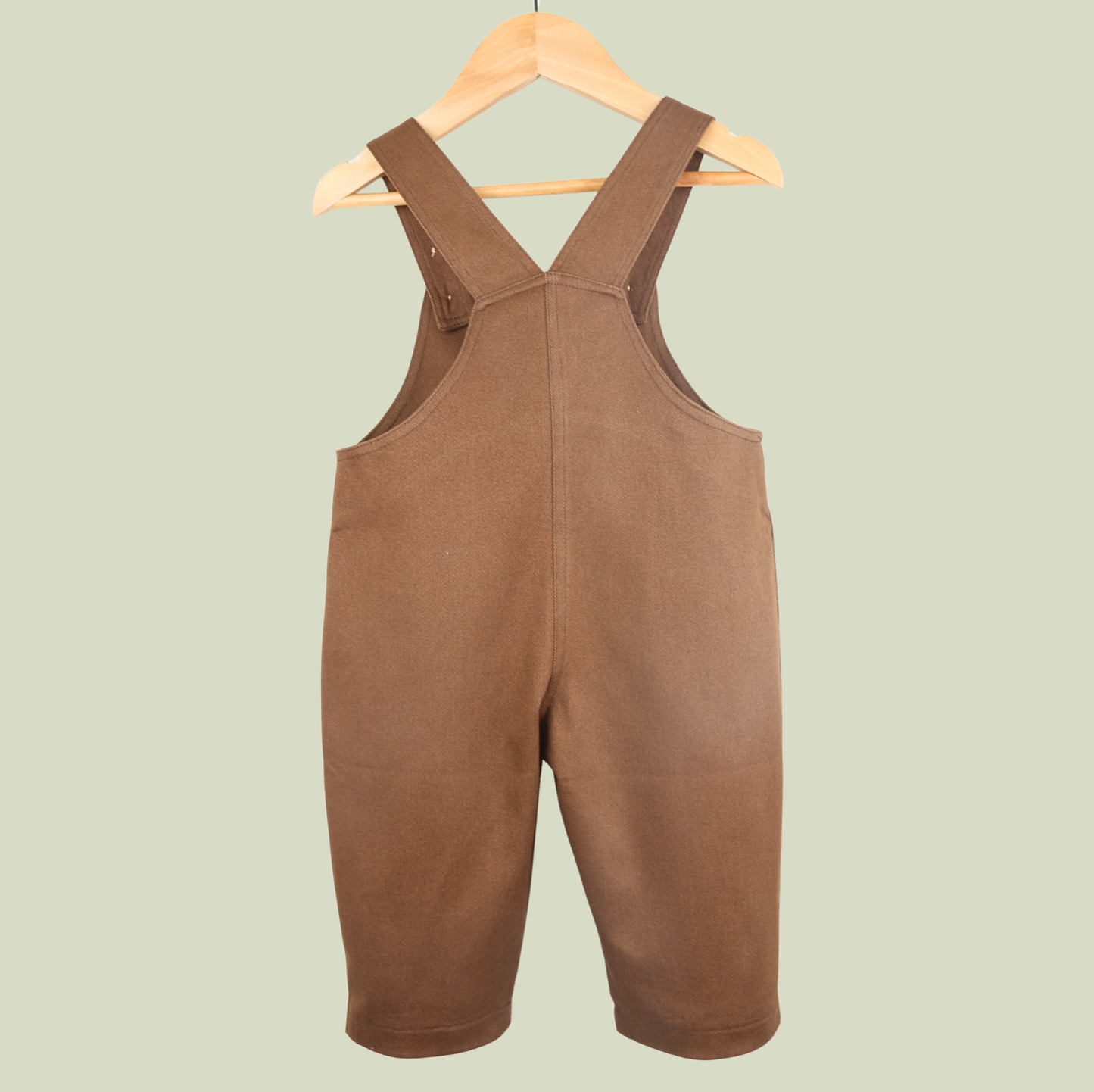 Brown baby dungarees with rainbow embroidery
