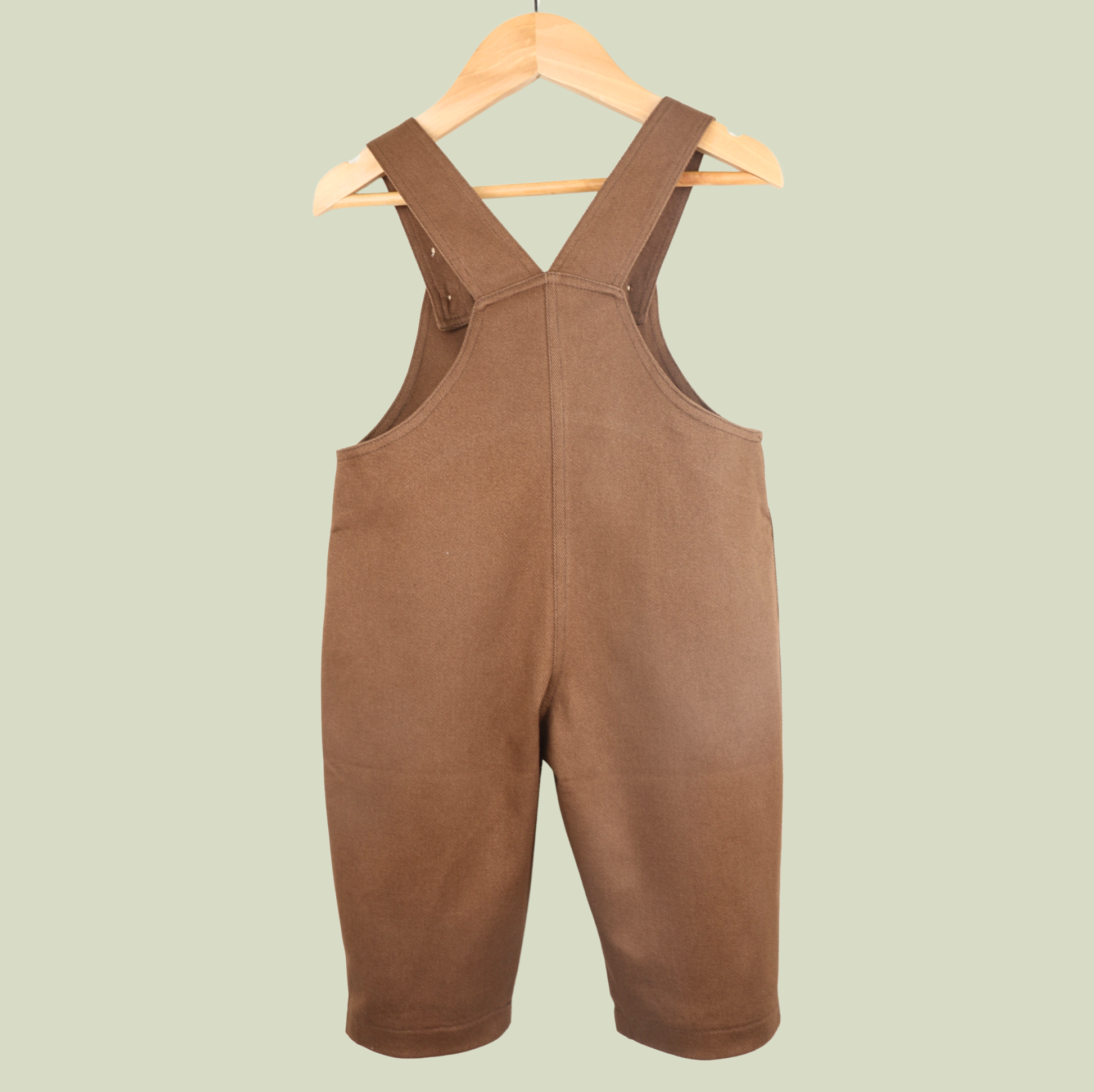 Brown baby dungarees with rainbow embroidery