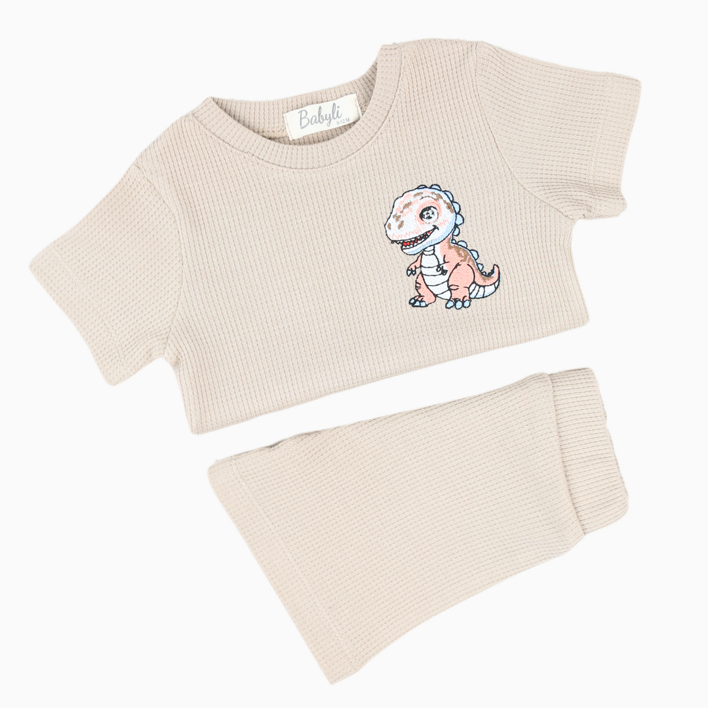 Cream baby and toddler t-shirt and shorts set with dinosaur embroidery