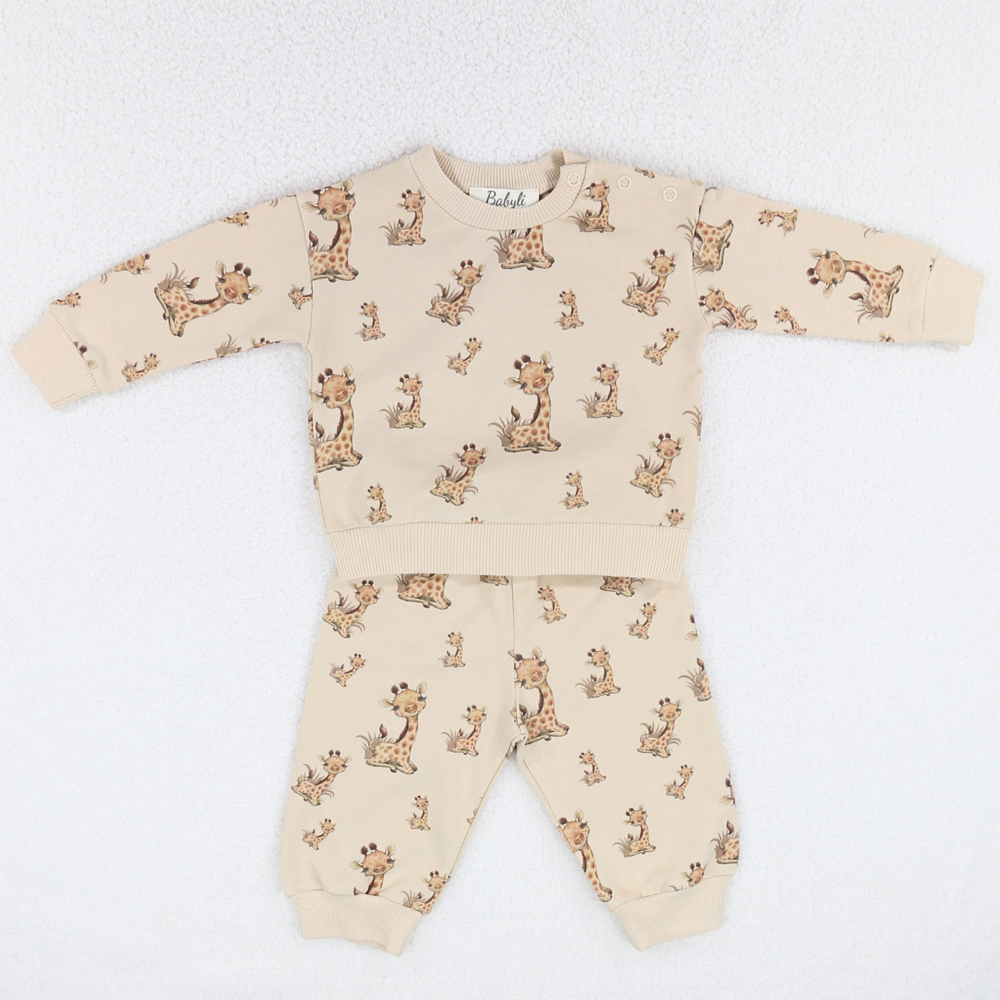 Beige baby and toddler sweatshirt and jogger set with giraffe print