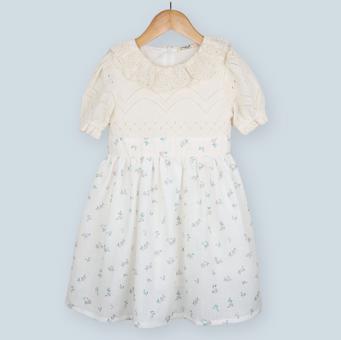 Cream girls dress with knitted top and delicate floral skirt