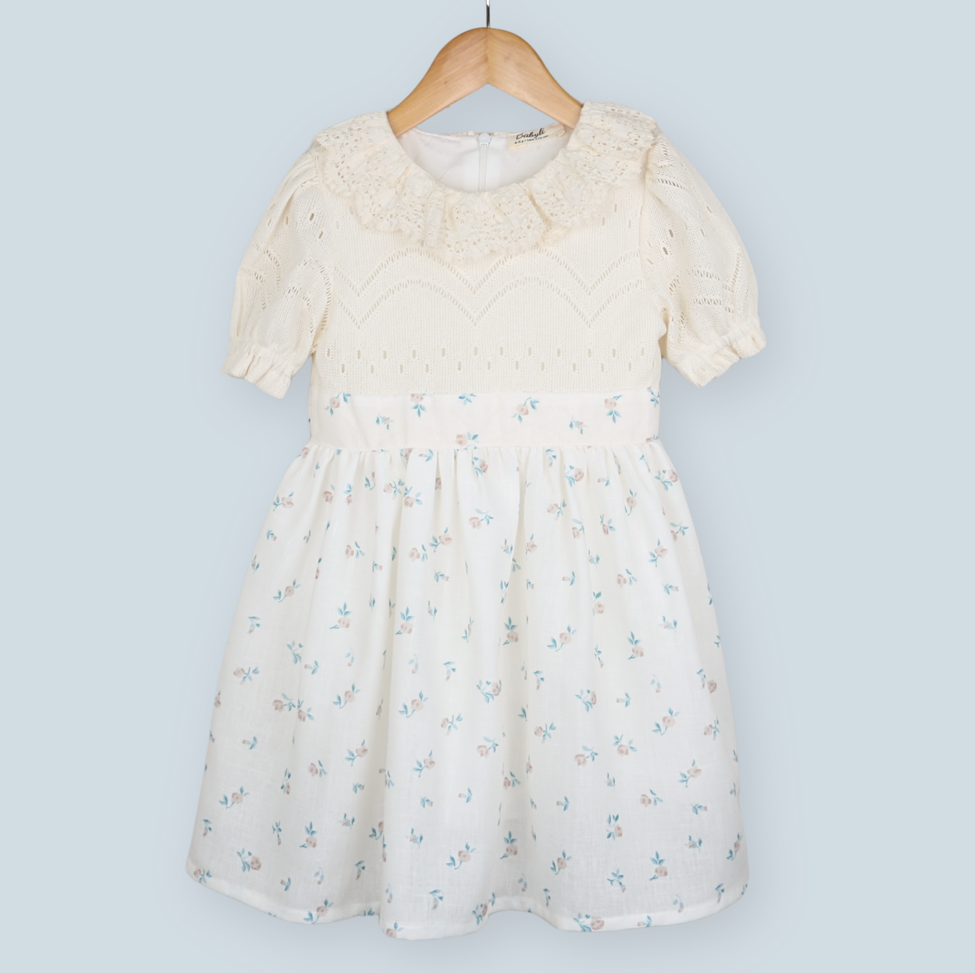 Cream girls dress with knitted top and delicate floral skirt