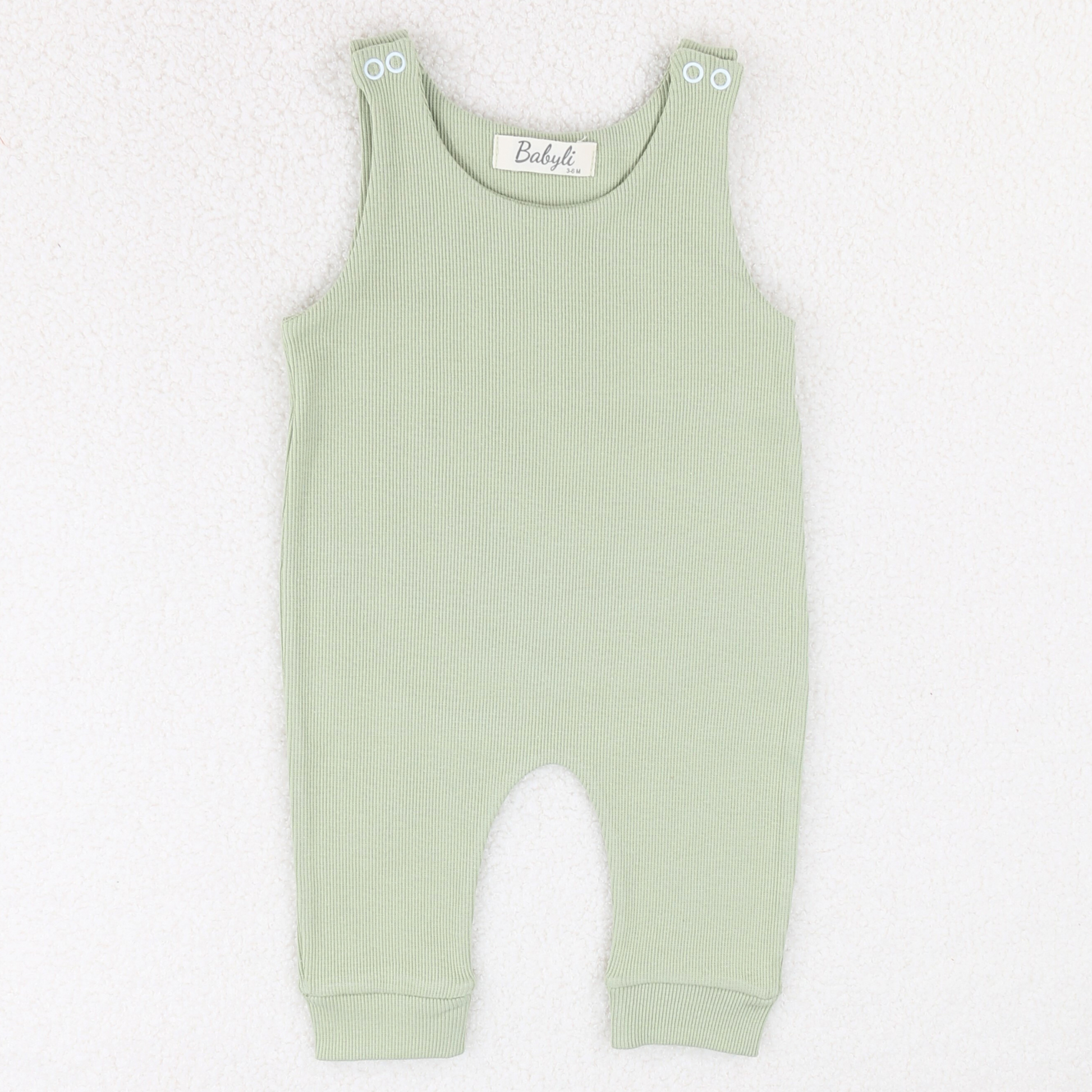 Sage green ribbed baby dungarees for babies and toddlers