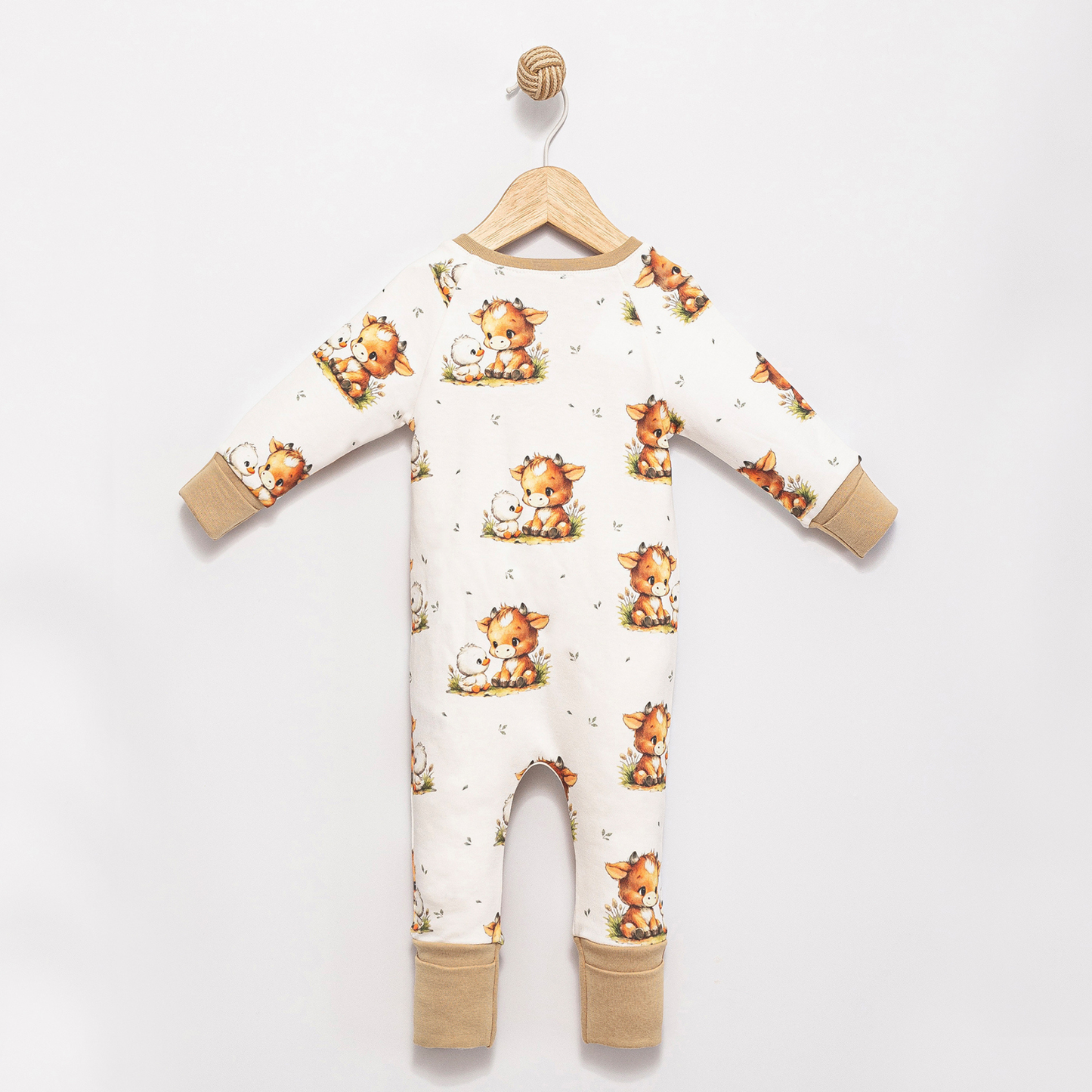 Back view of Babyli Highland Cow Double Zip Baby Sleepsuit featuring an all-over Highland cow print and soft ribbed cuffs