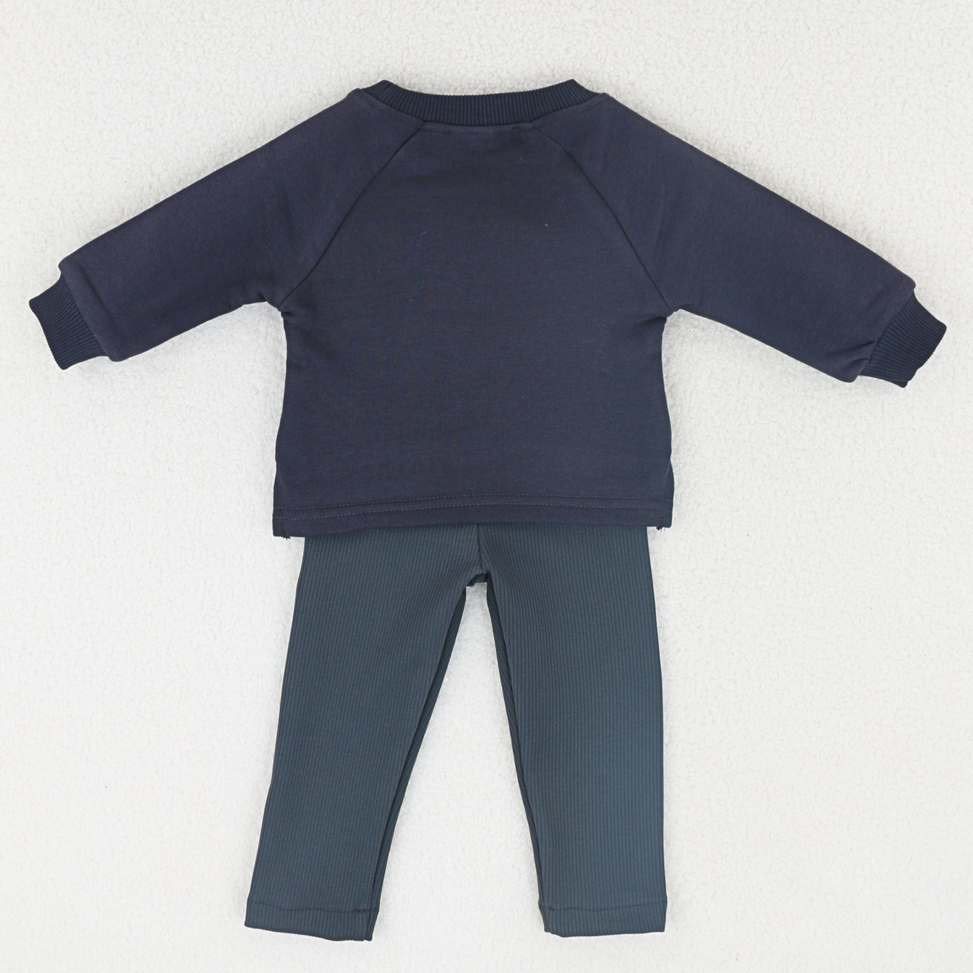 Young girl and boy wearing navy sweatshirt with bumblebee embroidery