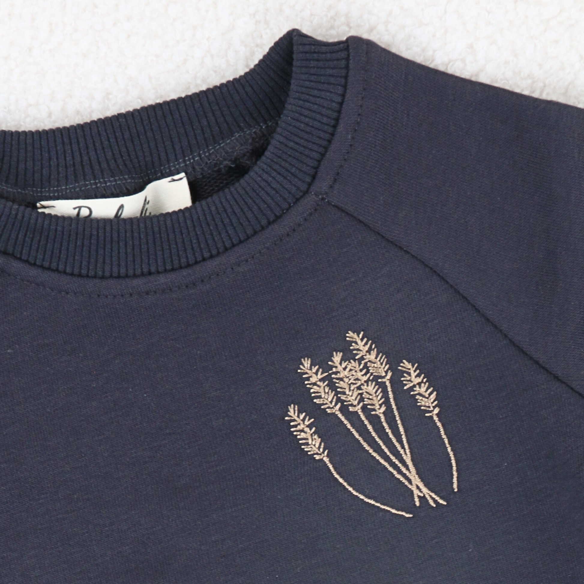 Navy baby sweatshirt and ribbed leggings set with embroidered detail